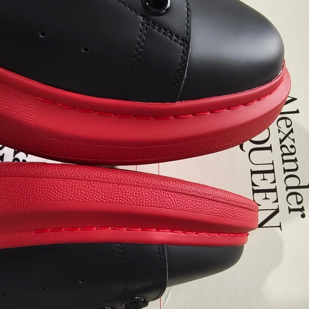 Alexander McQueen Black Leather Sneakers with Red Soles